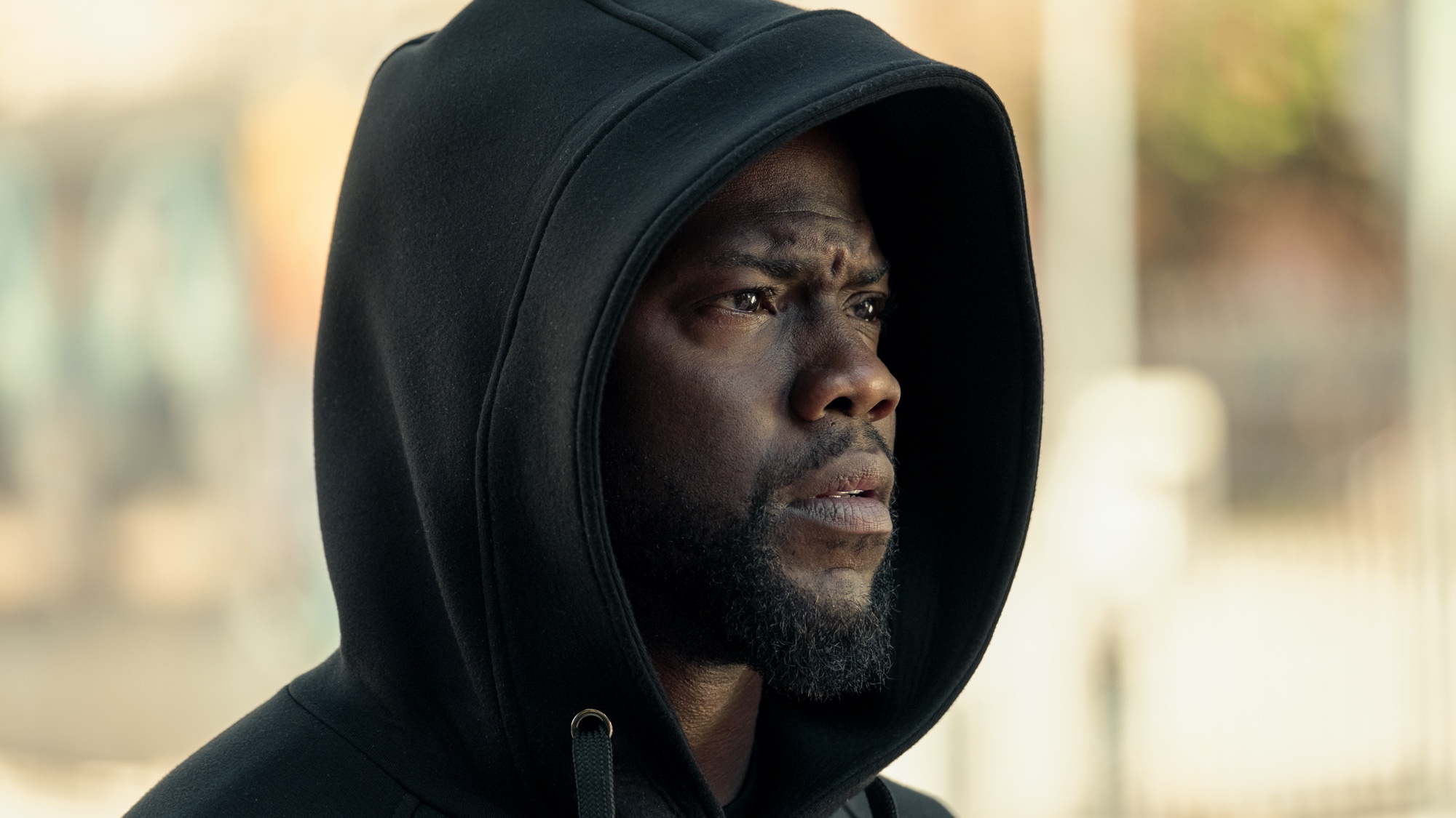 The Kid (played by) Kevin Hart has a confused look on his face in this still from True Story, one of the best Netflix shows