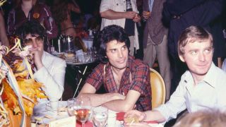 Freddie Mercury at a table at Queen's Jazz launch party
