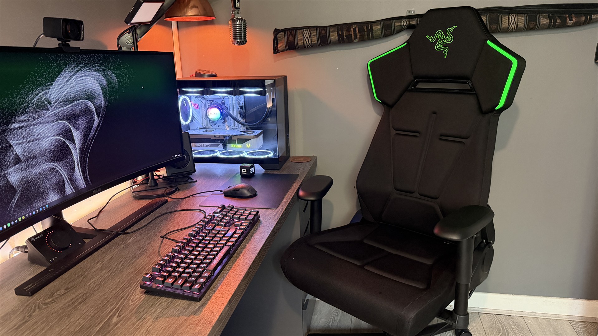 The Razer Soma Chroma gaming chair set up in front of a desk.
