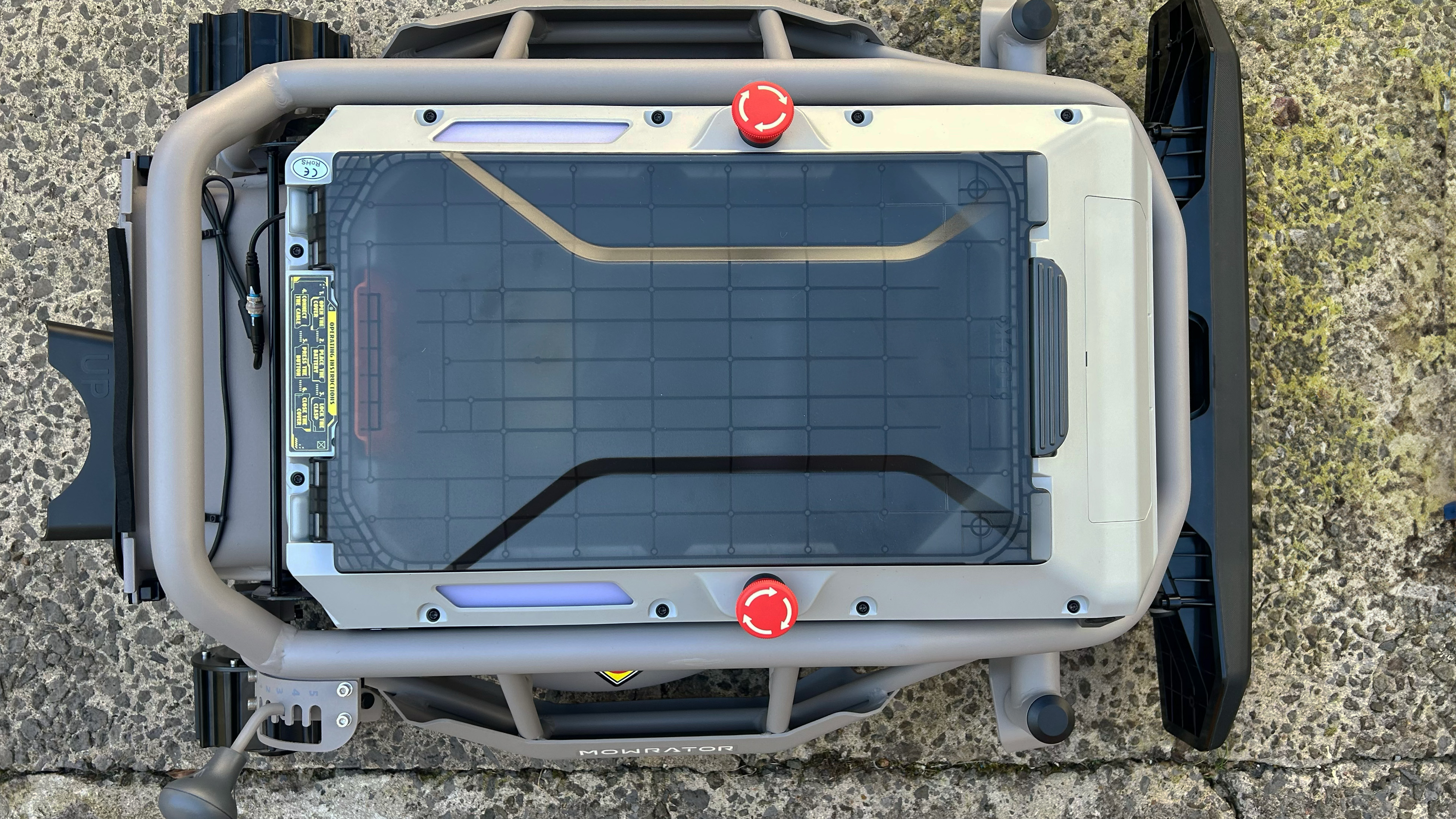 Top view of the battery compartment for the Mowrator S1 2WD lawnmower.