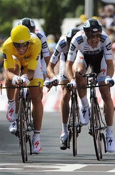 Yellow jersey wearer Fabian Cancellara leads his team Saxo Bank into the finish.