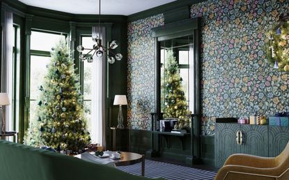 how to store and organize holiday decor, Christmas tree in living room with bold wallpaper