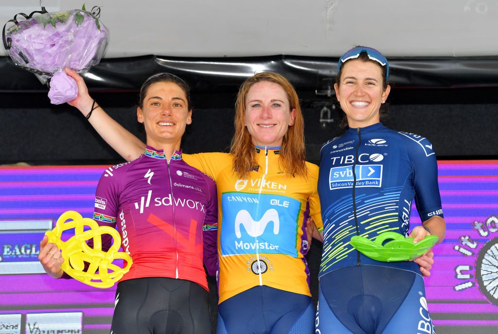 HALDEN NORWAY AUGUST 15 LR Ashleigh Moolman Pasio of South Africa and Team SD Worx on second place stage winner Annemiek Van Vleuten of Netherlands and Movistar Team Women yellow leader jersey and Kristen Faulkner of United States and Team Tibco Silicon Valley Bank on third place pose on the podium during the podium ceremony after the 7th Ladies Tour Of Norway 2021 Stage 4 a 1416km stage from Drbak to Halden LTourOfNorway LTON21 UCIWWT on August 15 2021 in Halden Norway Photo by Luc ClaessenGetty Images