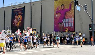 Striking writers and actors outside the Warner Bros. Studios in Burbank. 