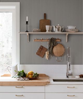 Black and white striped wallpaper in kitchen