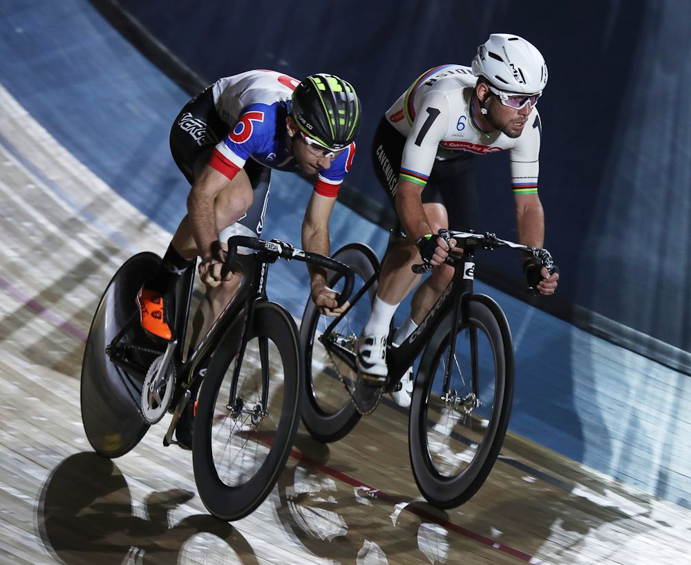 Morgan Kneisky of France and Mark Cavendish of Great Britain compete in the Madison chase during day one of the Six Day London