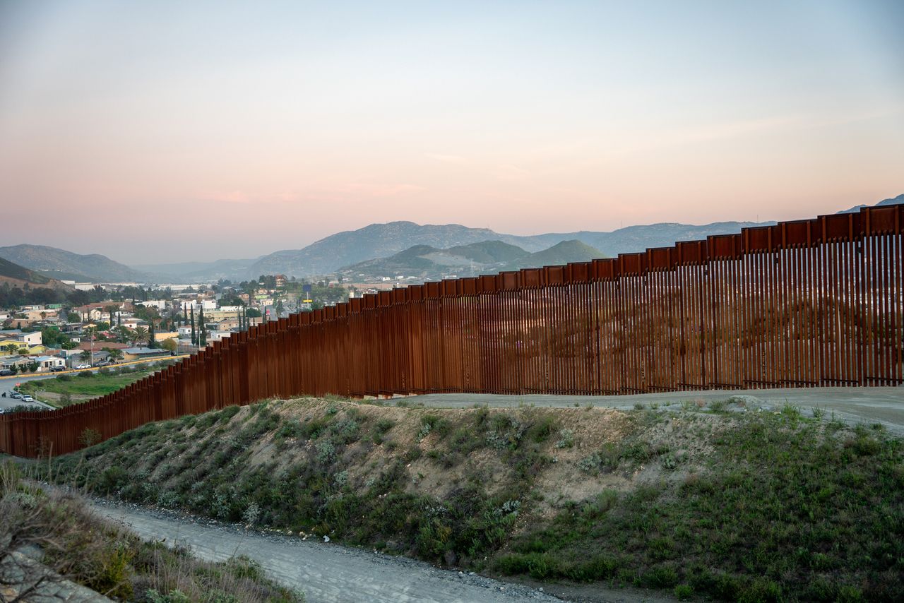 International Border Wall Between Tecate California and Tecate Mexico 