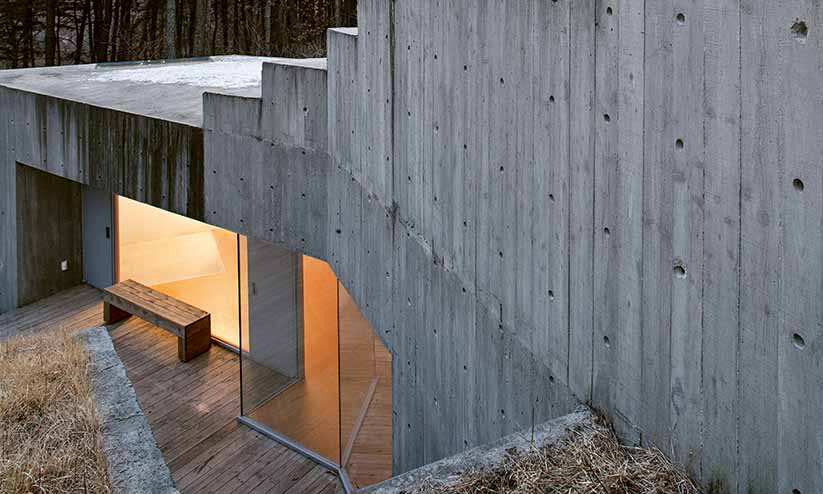 concrete house in countryside featured in Earth Works: Houses by Byoung Cho - Community House, 2008