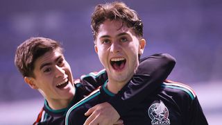 Brian Gutiérrez of Mexico celebrates after scoring the team's first goal during the international friendly match between Mexico and Ghana at Estadio Cuauhtémoc on May 22, 2026 in Puebla, Mexico.