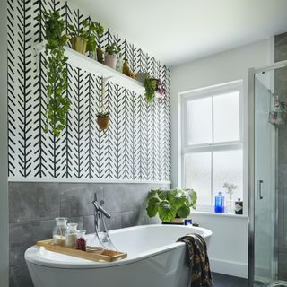 bath with plant shelf above