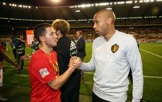 Eden Hazard and Thierry Henry celebrate after winning the UEFA Nations League A group two match between Belgium and Switzerland at King Baudouin stadion on October 12, 2018 in Brussels, Belgium.