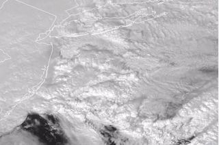 Convective clouds add a touch of fluffy beauty to the powerful snowstorm over the northeastern United States on March 7, 2018 in this view from the GOES-16/GOES-East weather satellite.