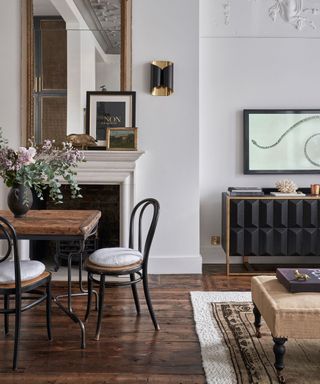 Scandinavian living room with dark wood floor and white walls