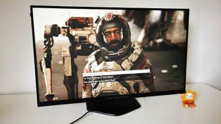 Alienware AW2724HF monitor with Barrett from Starfield on screen