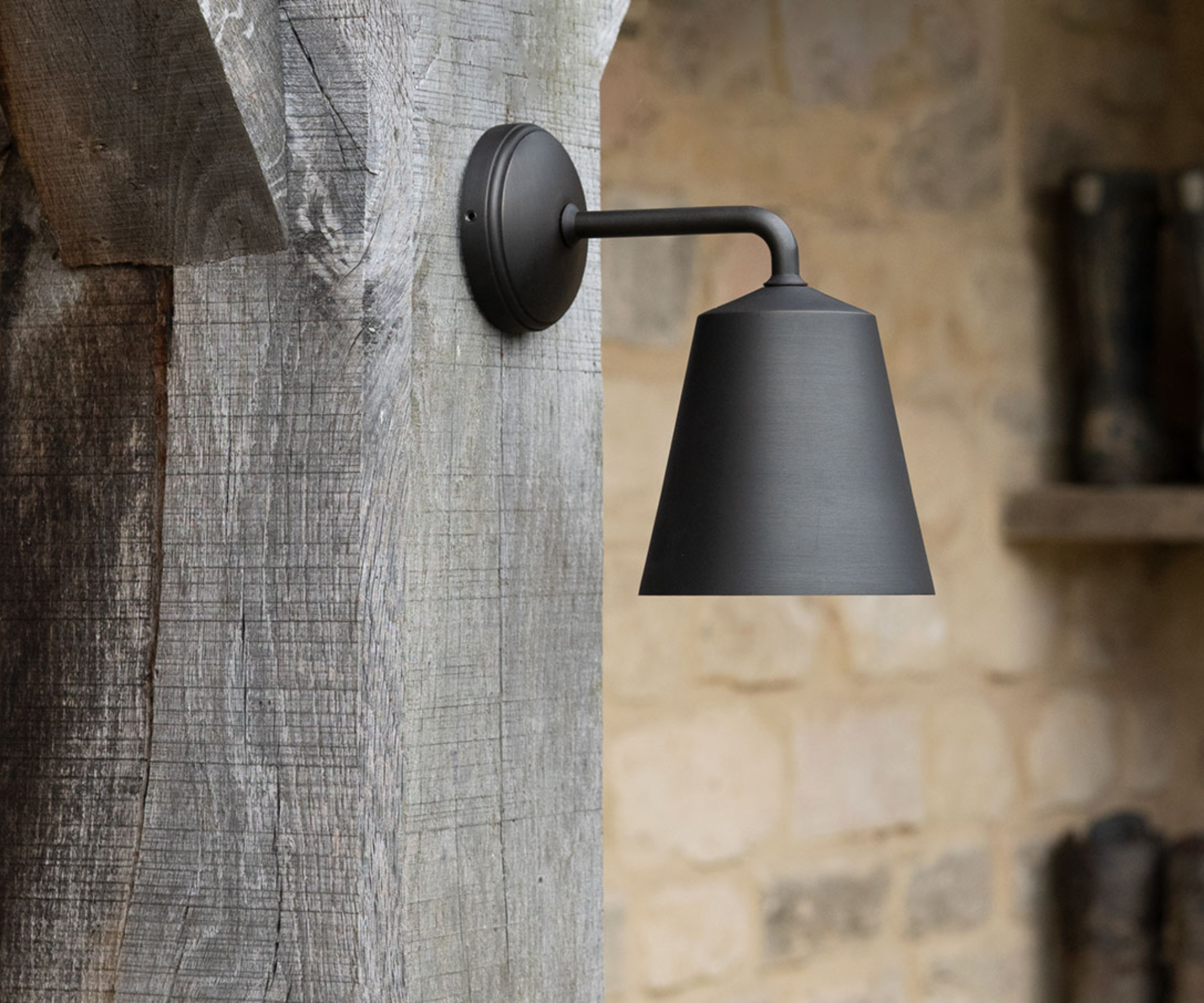 black wall light on oak frame porch