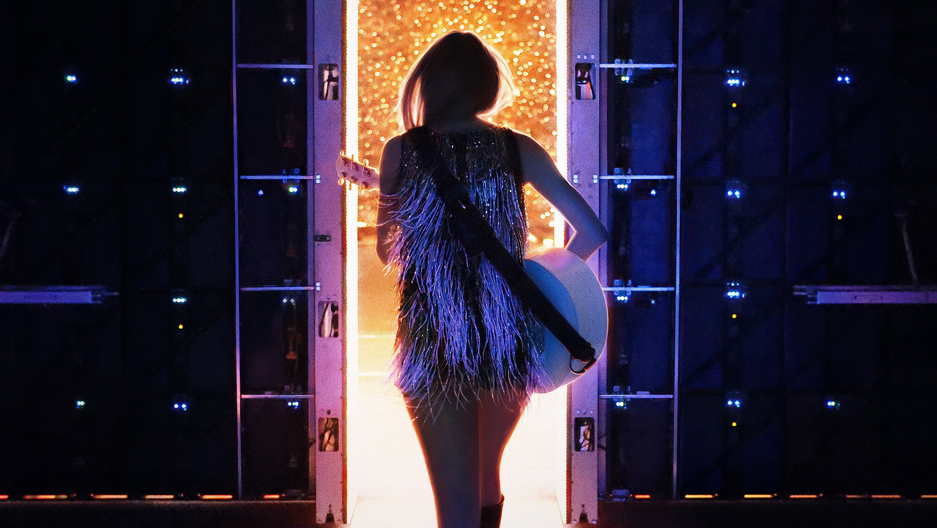 Taylor Swift holding a guitar, her back turned to us.