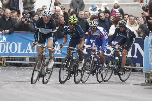 Fabian Wegmann (Leopard - Trek), Andrey Amador Bakkazakova (Movistar) and Davide Malacarne (QuickStep) lead around the bend