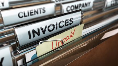 Folders in a filing cabinet have labels that say Clients, Company, Invoices and Unpaid.