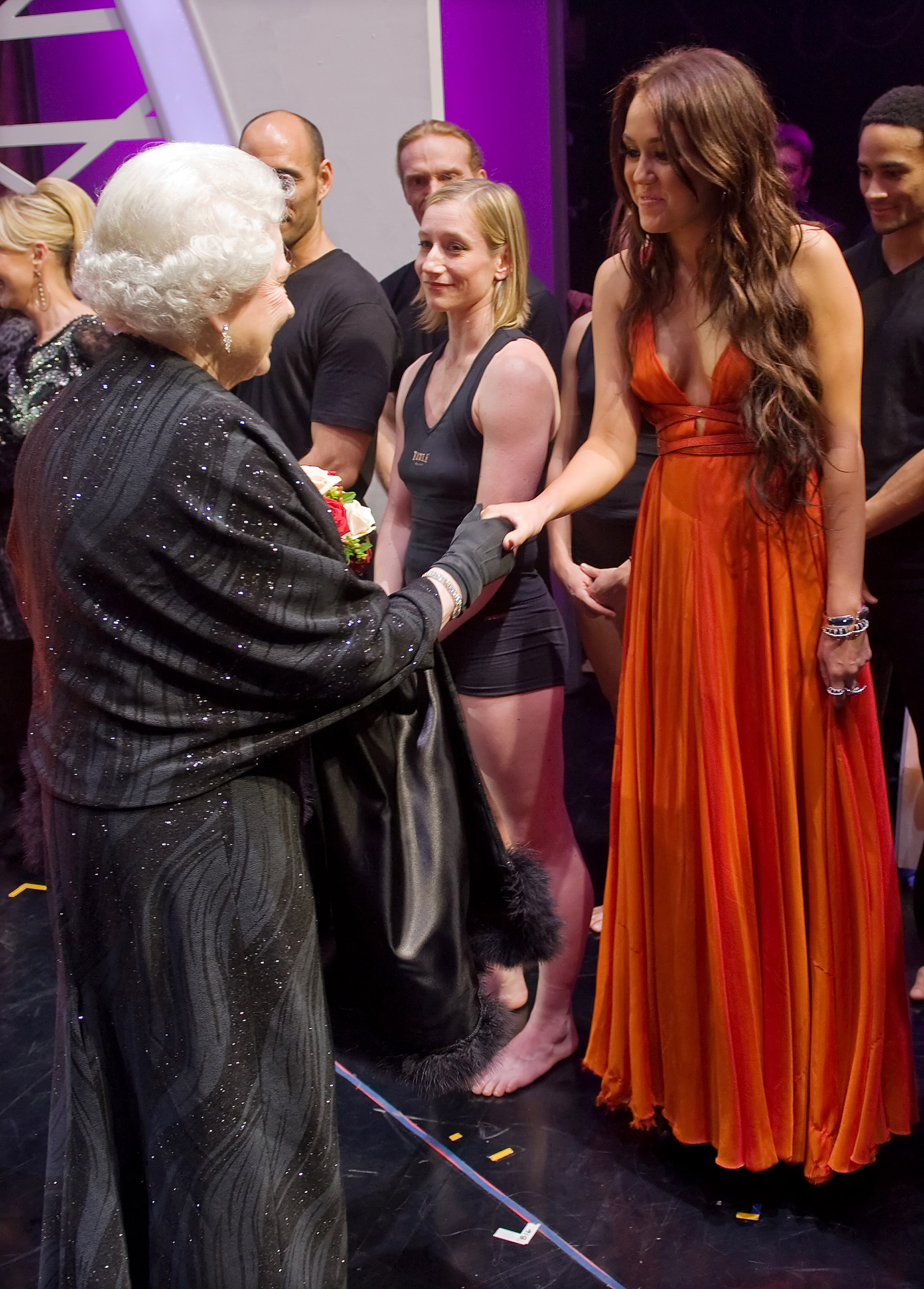 Queen Elizabeth II meets singer Miley Cyrus following the Royal Variety Performance on December 7, 2009 in Blackpool, England