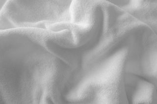 A close up of a soft, white towel.