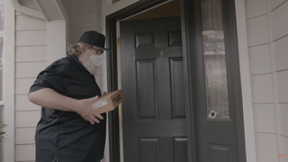 Gabe Newell delivering a Steam Deck.