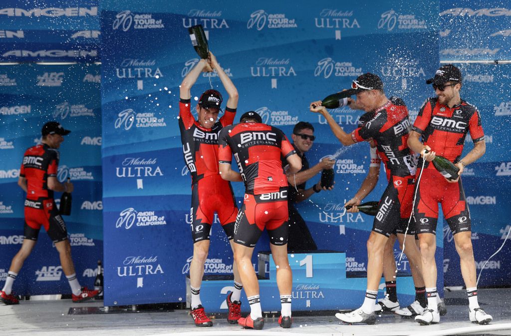 The BMC team get into the celebration with Brent Bookwalter pouring champagne over his own head