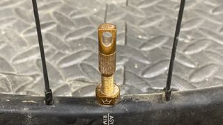 Peaty's tubeless valve on a wheel rim