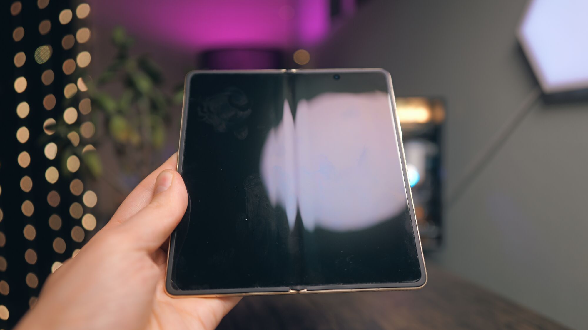 Honor Magic V6 smartphone in gold