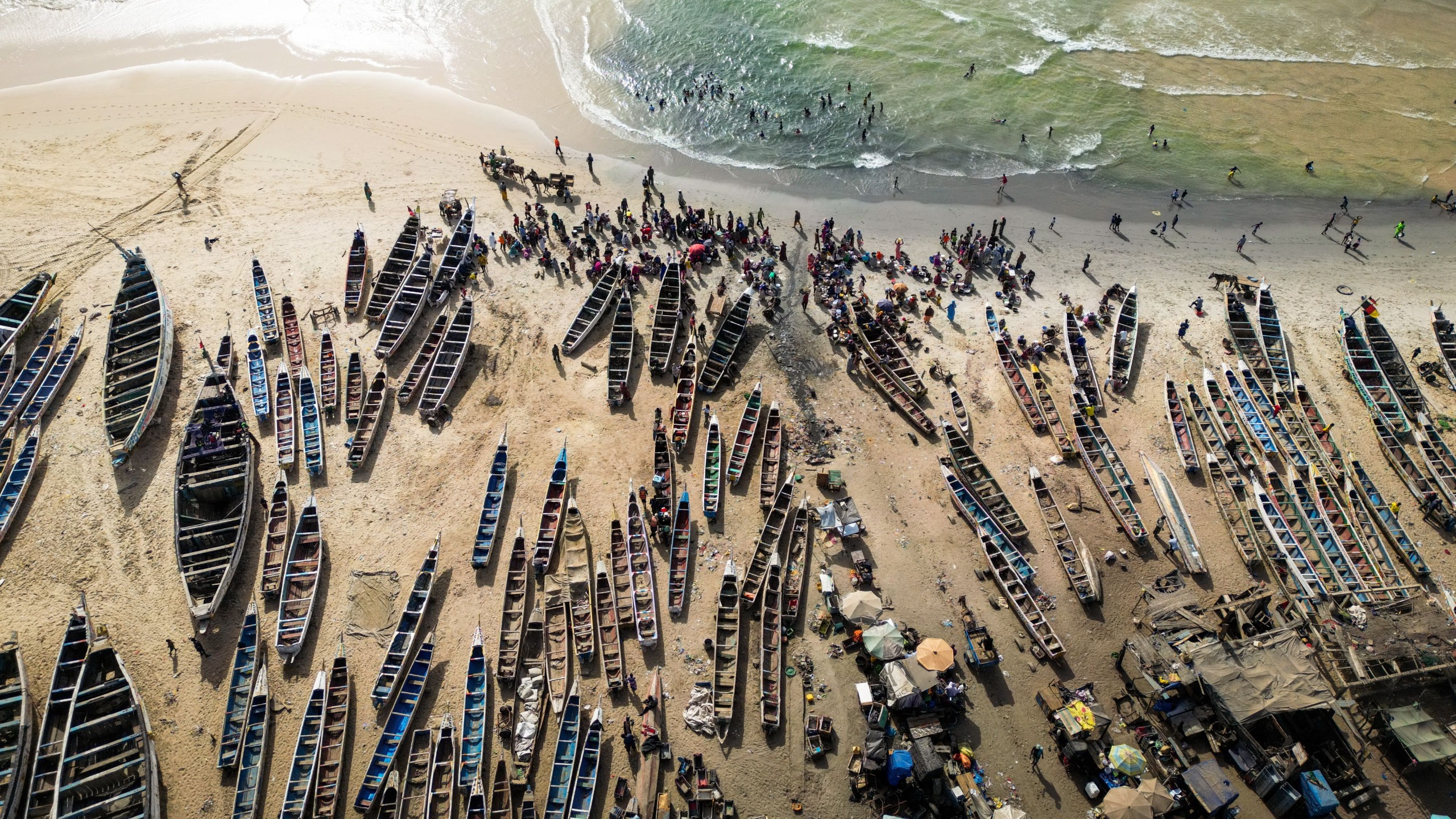 aerial image of fishing boats on a beach