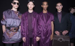 4 male models wearing different shades of purple