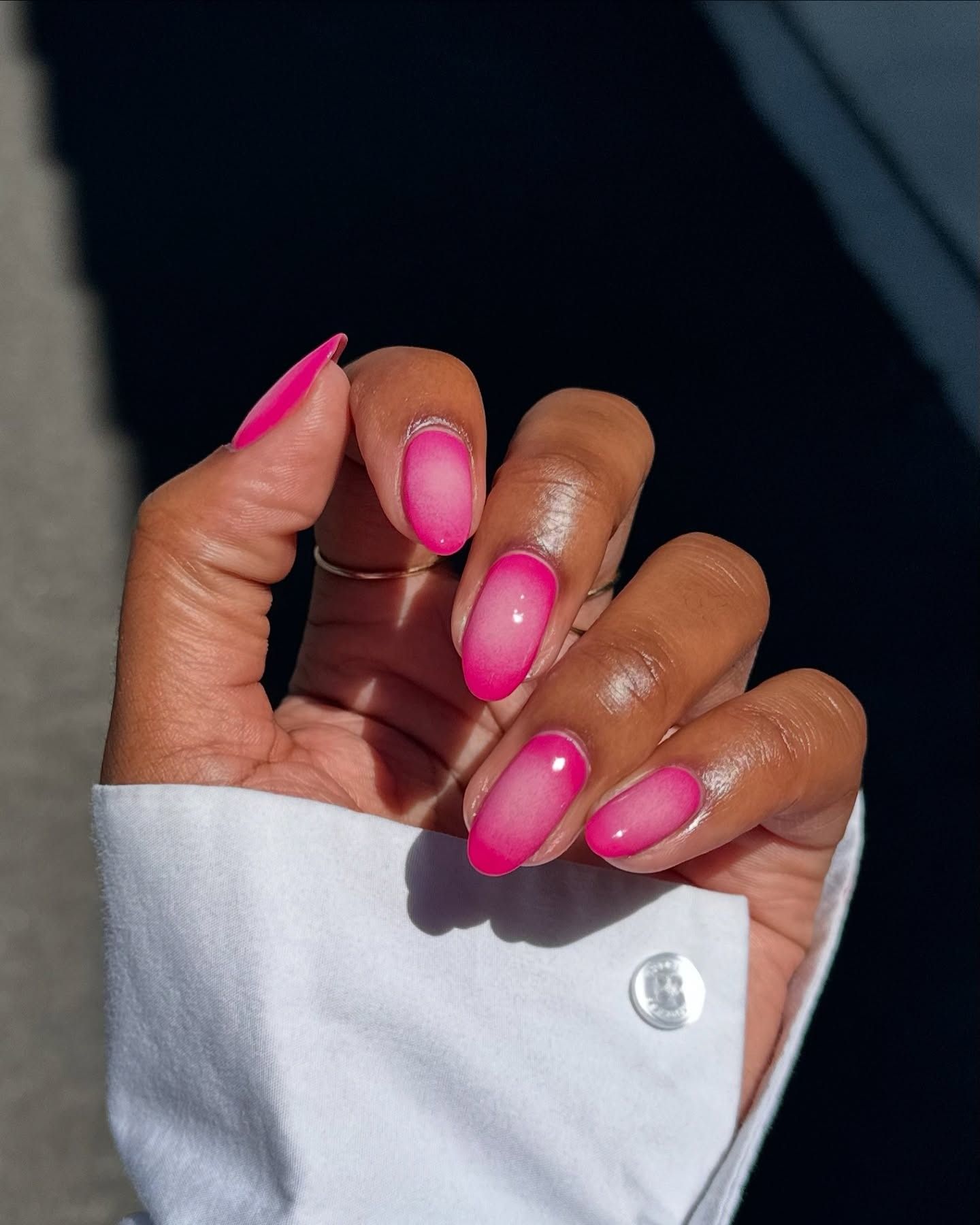 Pink ombre nails.