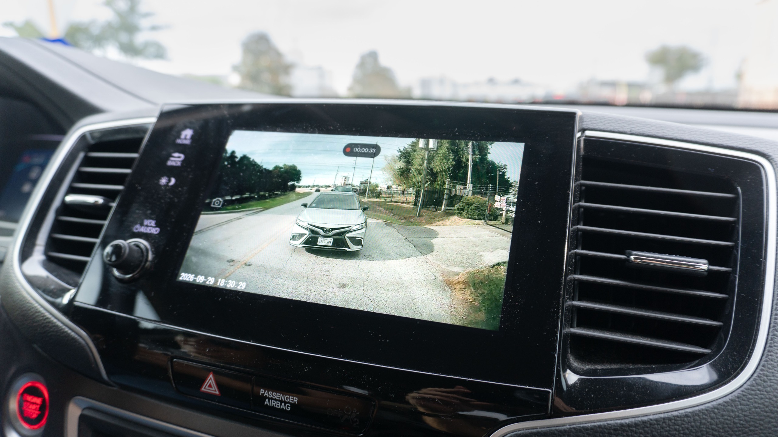 The Ottocast OttoSafe Cam's rear camera shown on a car's infotainment screen
