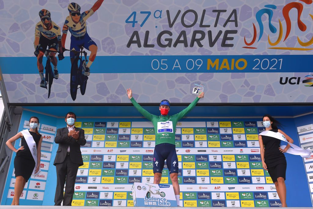 ALTO DO MALHO LOUL PORTUGAL MAY 09 Sam Bennett of Ireland and Team Deceuninck QuickStep Green Points Jersey celebrates at arrival during the 47th Volta Ao Algarve 2021 Stage 5 a 1701km stage from Albufeira to Alto do Malho 510m Loul Hostess Covid safety measures Mask VoltAlgarve VAlgarve2021 on May 09 2021 in Alto do Malho Loul Portugal Photo by Luc ClaessenGetty Images