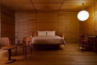 bedroom interior with brown wooden finishings