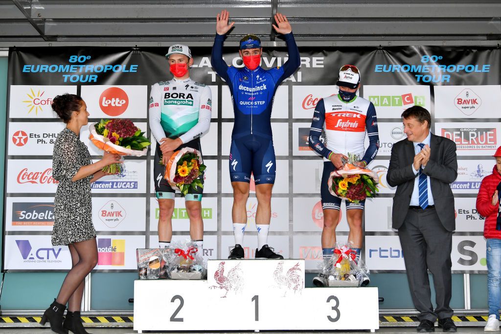 TOURNAI BELGIUM SEPTEMBER 29 LR Jordi Meeus of Belgium and Team Bora Hansgrohe on second place stage winner Fabio Jakobsen of Netherlands and Team Deceuninck QuickStep and Mads Pedersen of Denmark and Team Trek Segafredo on third place celebrate on the podium during the podium ceremony after the 80th Euromtropole Tour 2021 a 1776km race from La Louvire to Tournai Eurometrotour on September 29 2021 in Tournai Belgium Photo by Luc ClaessenGetty Images