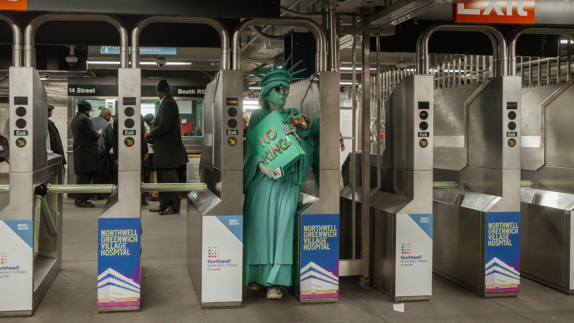 A person dressed as the Statue of Liberty