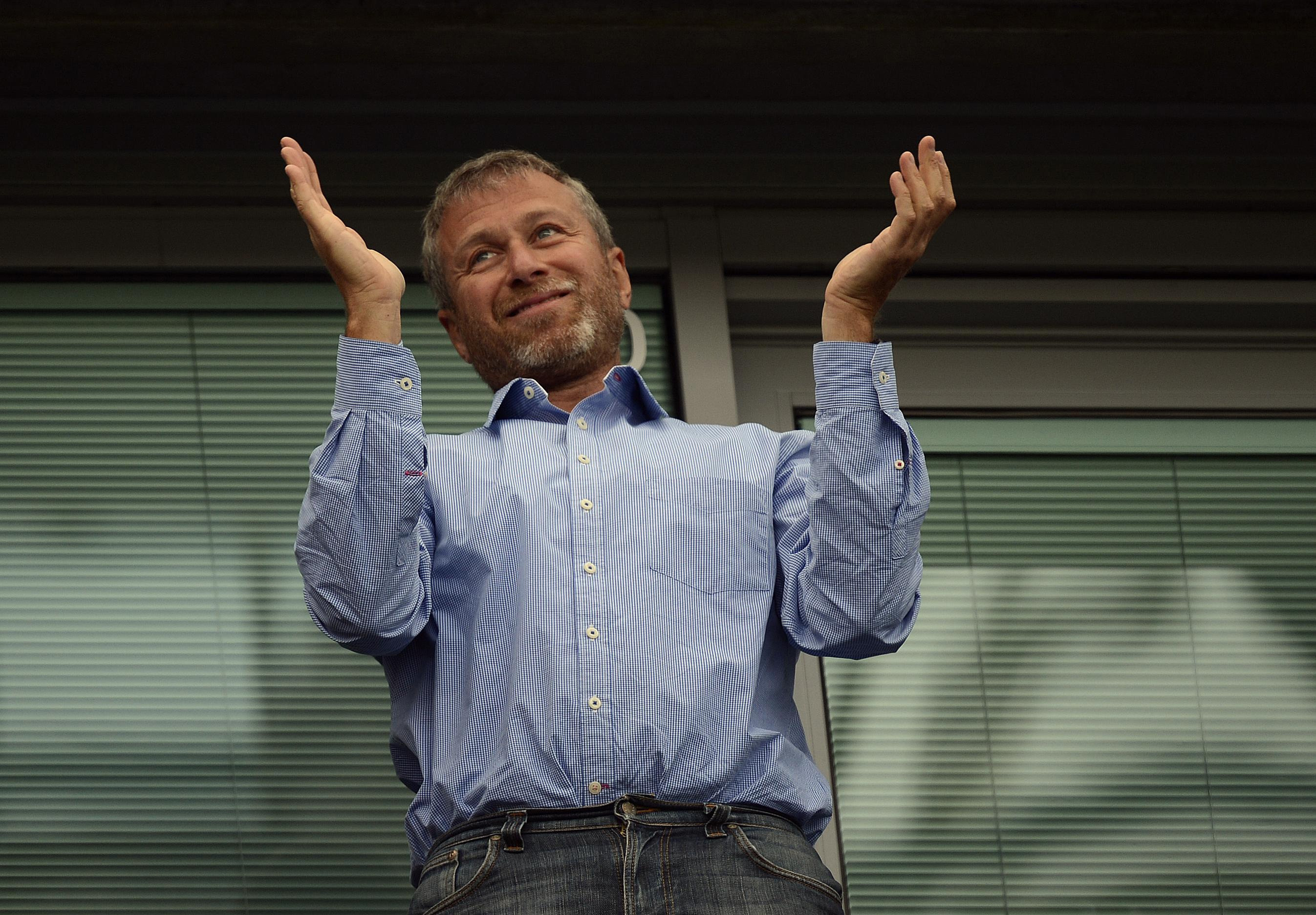 Roman Abramovich former Chelsea owner claps at Stamford Bridge as the Blues win in the Premier League