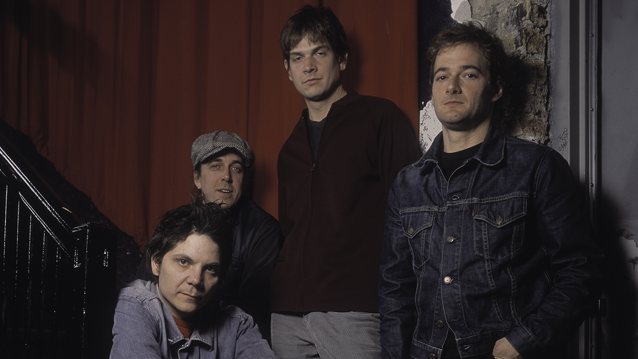 Wilco pose backstage at the Riviera Theater, Chicago, Illinois, November 23, 2001: Jeff Tweedy, Nels Cline, Glen Kotche, and John Stirratt