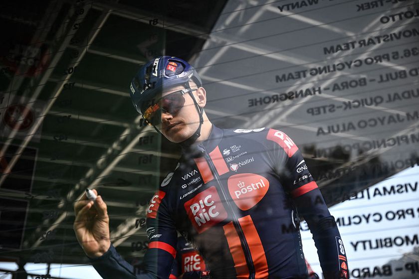 Team Picnic PostNL&rsquo;s British rider Oscar Onley looks on from the sign-in podium ahead of the 119th edition of the Giro di Lombardia (Tour of Lombardy), a 238km cycling race from Como to Bergamo on October 11, 2025. (Photo by Marco BERTORELLO / AFP)