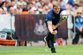 Newcastle United's English head coach Eddie Howe plays with the ball during the English Premier League football match between Newcastle United and Nottingham Forest at St James' Park in Newcastle-upon-Tyne, north east England on August 6, 2022.