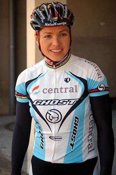 Sabine Spitz with the new jersey as she secured a new sponsor, with central health insurance.