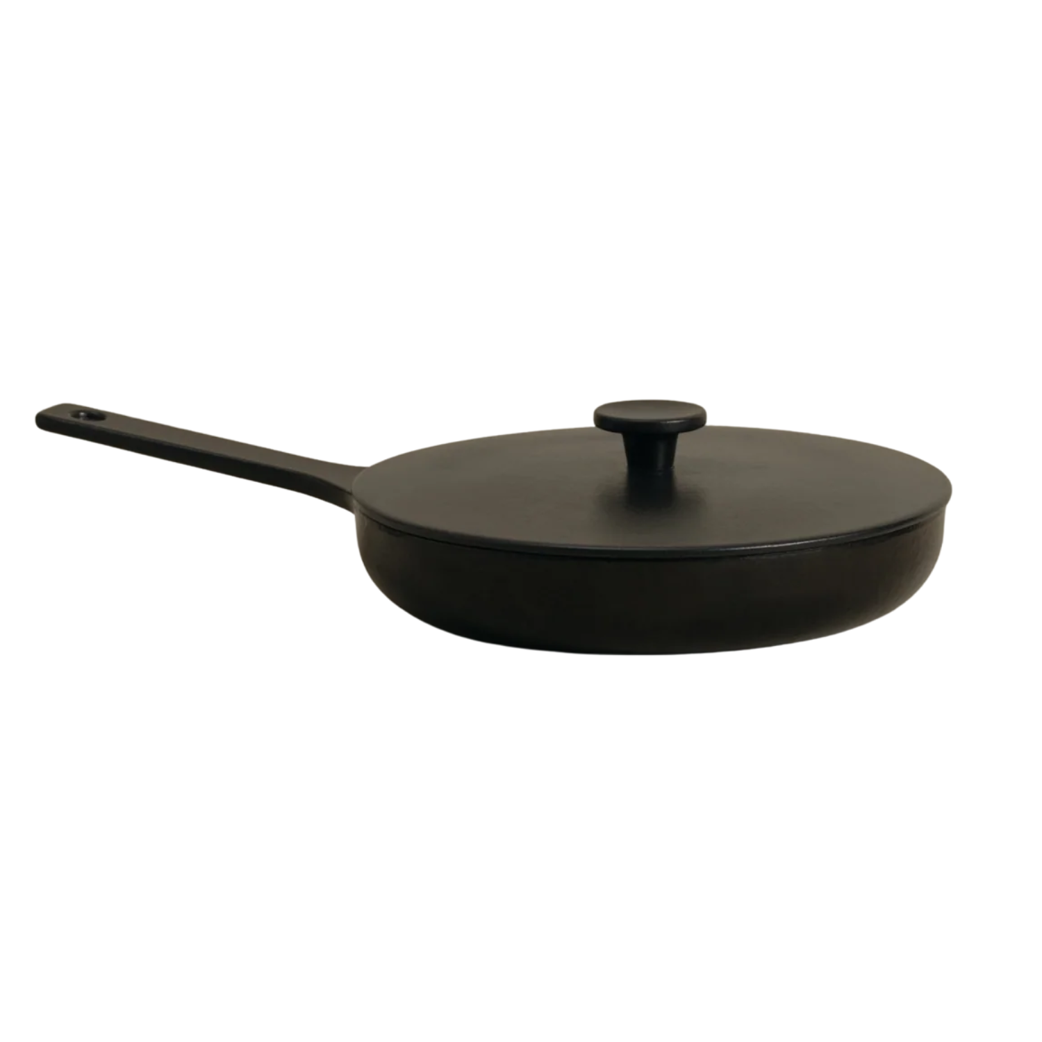 A black cast iron skillet pan by Katto
