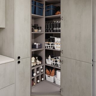 A corner larder in grey in a kitchen