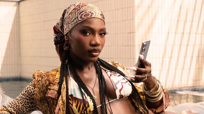 Doechii holding Galaxy S25 Edge mobile phone as part of Samsung US promotional campaign 