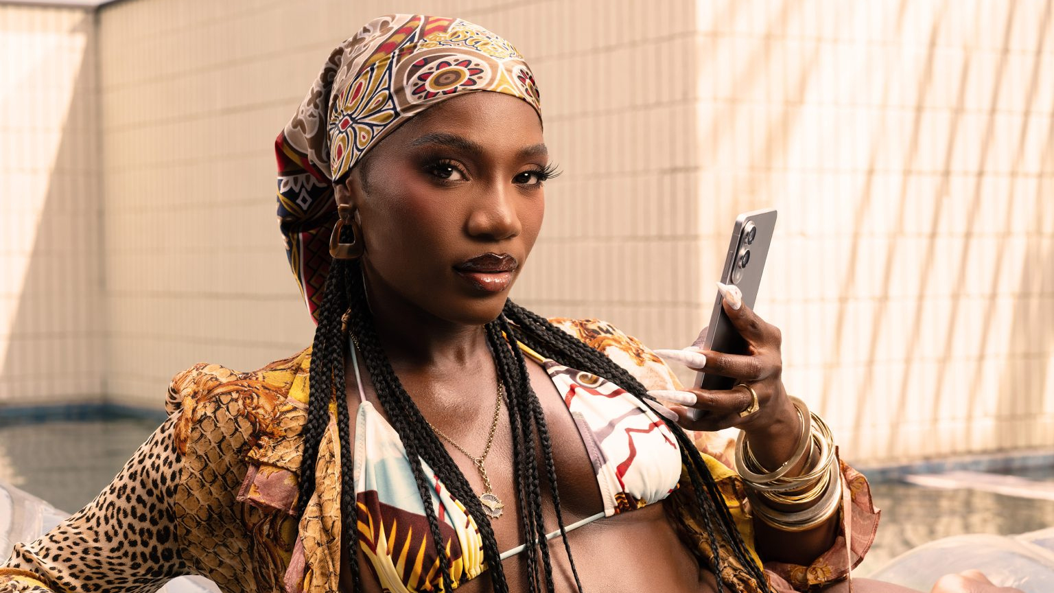 Doechii holding Galaxy S25 Edge mobile phone as part of Samsung US promotional campaign 