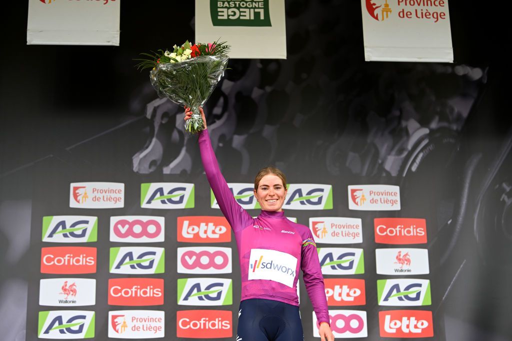 LIEGE BELGIUM APRIL 23 Demi Vollering of The Netherlands and Team SD Worx celebrates at podium as Pink UCI Womens WorldTour Leader Jersey winner during the 7th Liege Bastogne Liege 2023 Womens Elite a 1428km one day race from Bastogne to Lige UCIWWT on April 23 2023 in Lige Belgium Photo by Luc ClaessenGetty Images
