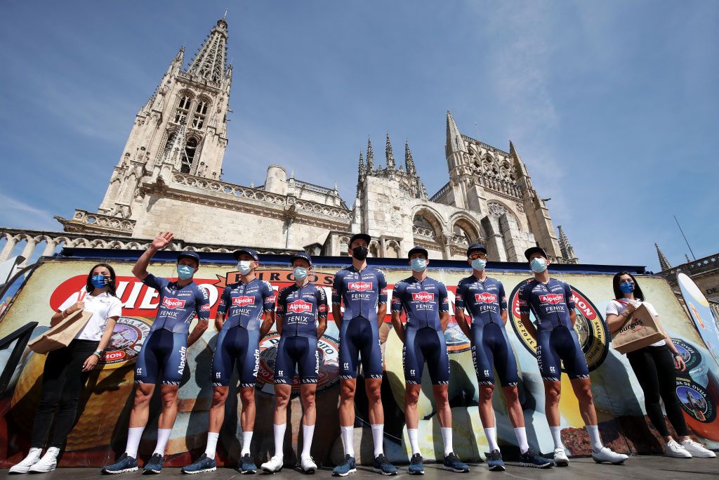 BURGOS SPAIN AUGUST 03 Vine Jay of Australia De Tier Floris of Belgium Bayer Tobias of Austria Taminiaux Lionel of Belgium Planckaert Edward of Belgium Modolo Sacha of Italy Thwaites Scott of United Kingdom and Team AlpecinFenix prior to the 43rd Vuelta a Burgos 2021 Stage 1 a 161km stage from BurgosCatedral to BurgosAlto del Castillo 980m VueltaBurgos BurgosCycling CapitalMundialdelCiclismo catedral2021 on August 03 2021 in Burgos Spain Photo by Gonzalo Arroyo MorenoGetty Images