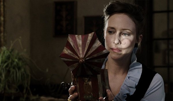 The Conjuring Vera Farmiga holding toy