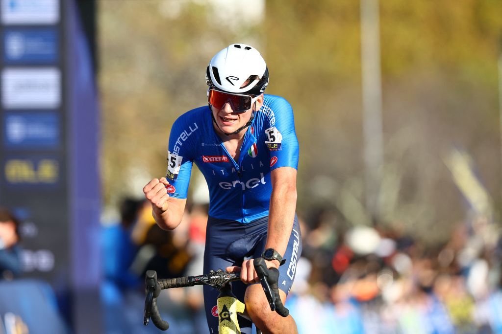 Italian Mattia Agostinacchio celebrates as he crosses the finish line to win the men junior race at the European Championships cyclocross cycling in Pontevedra, Spain, Sunday 03 November 2024. BELGA PHOTO DAVID PINTENS (Photo by DAVID PINTENS / BELGA MAG / Belga via AFP) (Photo by DAVID PINTENS/BELGA MAG/AFP via Getty Images)