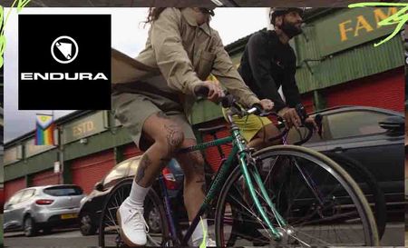 Endura logo placed over an image of two people cycling
